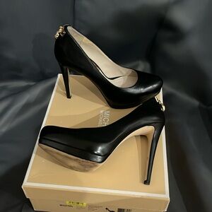 MICHAEL kors size 6.5 leather Hamilton pump. 4.75 in. heel and 1.25 in. platform